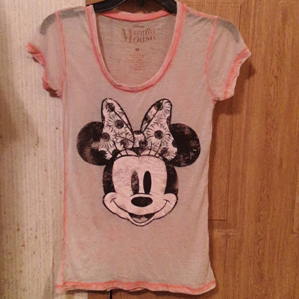 A pink see thru minnie mouse shirt